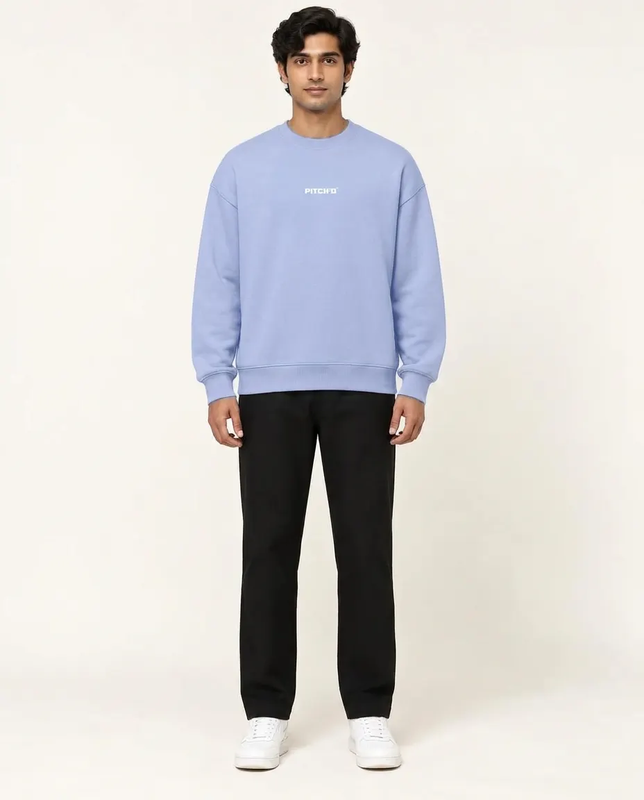 Model wearing a PITCH'D sweatshirt